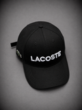 LACOSTE NEGRA LOGO BLANCO